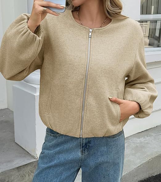 Women's short jacket with continuous zipper, balloon sleeves, and elastic hem Mune Fashion