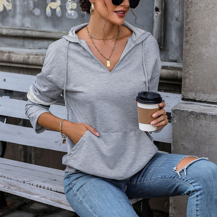 Women's hooded sweater with V-neck, kangaroo pocket, and contrasting sleeves Mune Fashion
