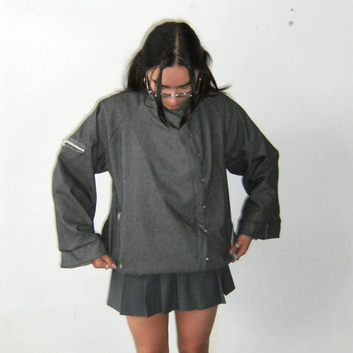 Women’s oversized boxy jacket with asymmetric button closure and arm pocket Mune Fashion