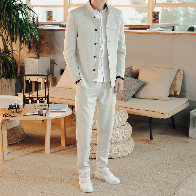 Men's Asian-inspired Mandarin jacket with stand-up collar, knot button placket, and tonal embroidered emblem Mune Fashion