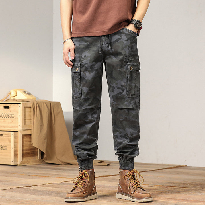 Men's tactical cargo jogger pants in camouflage look with drawstring waistband, reinforced knees, and cuffed hems Mune Fashion
