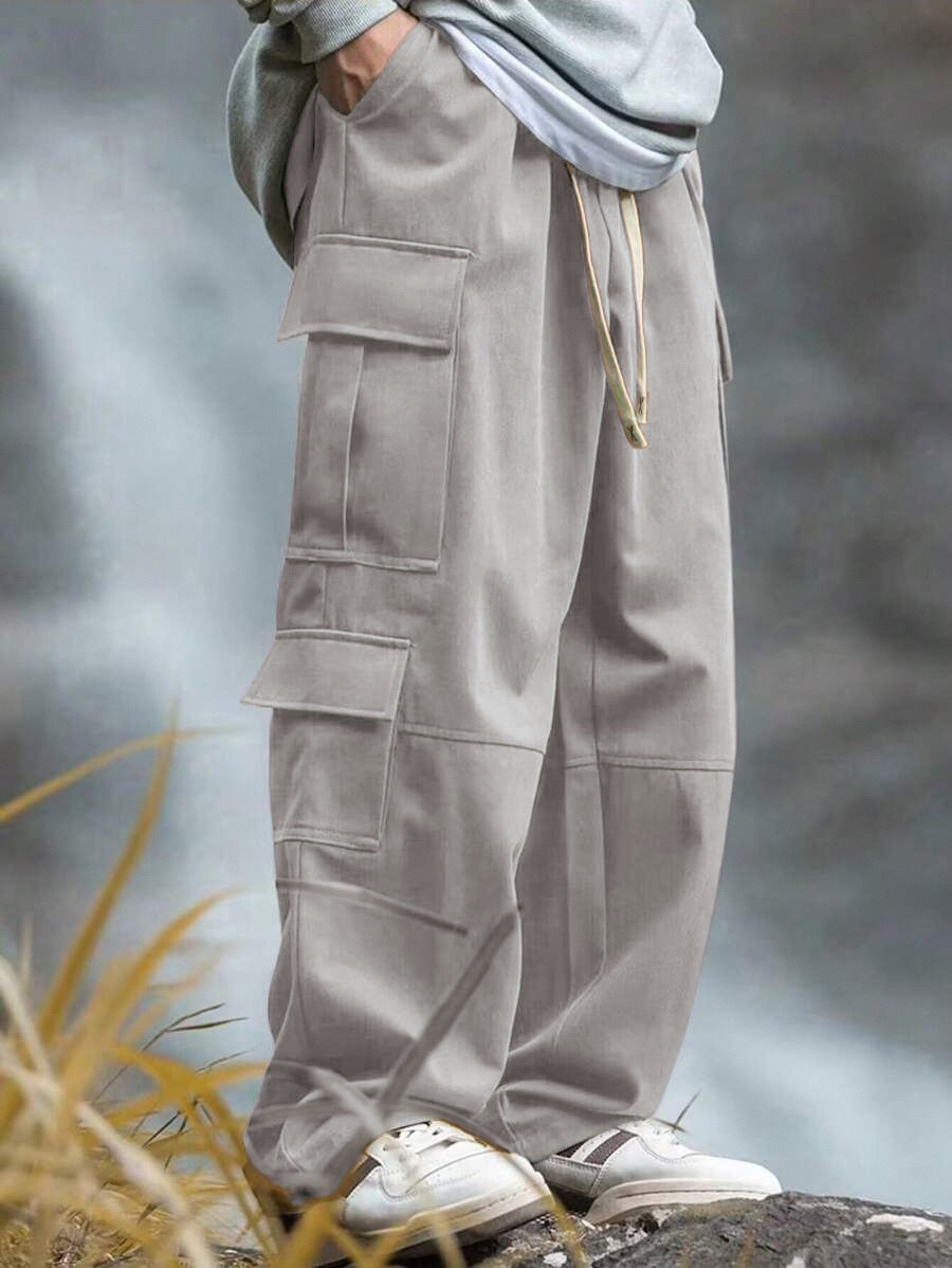 Men's loose cargo pants with multiple pockets, drawstring and reinforced knee areas Mune Fashion