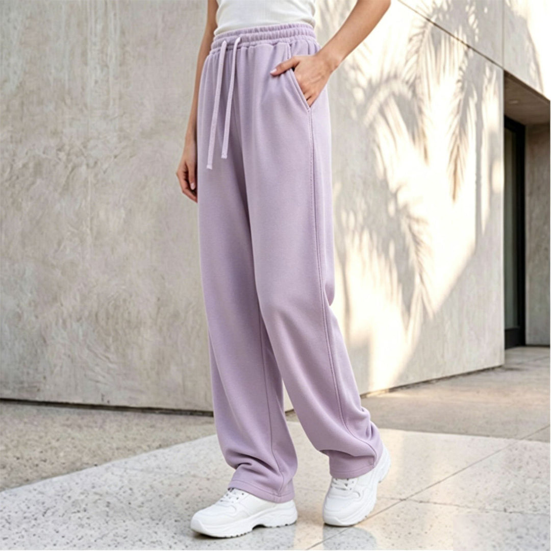 Women's wide lounge palazzo pants with high comfort waistband, drawstring, side pockets, and decorative side seam Mune Fashion