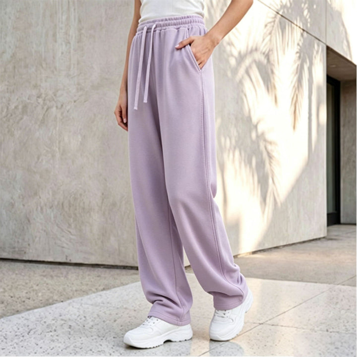 Women's wide lounge palazzo pants with high comfort waistband, drawstring, side pockets, and decorative side seam Mune Fashion