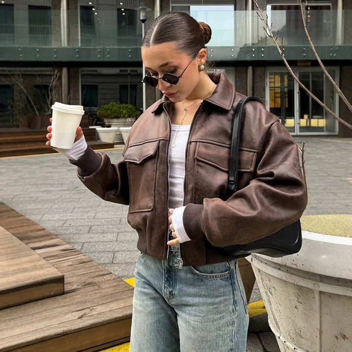 Women's short bomber jacket in suede look with large flap pockets and ribbed cuffs Mune Fashion