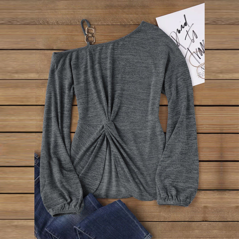 Women’s asymmetrical off-shoulder knit sweater with decorative chain strap and twisted knot front Mune Fashion