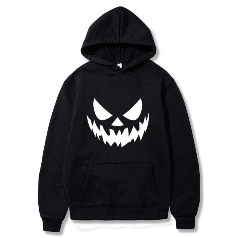 Unisex hooded sweatshirt with creepy pumpkin face print and oversized kangaroo pocket Mune Fashion
