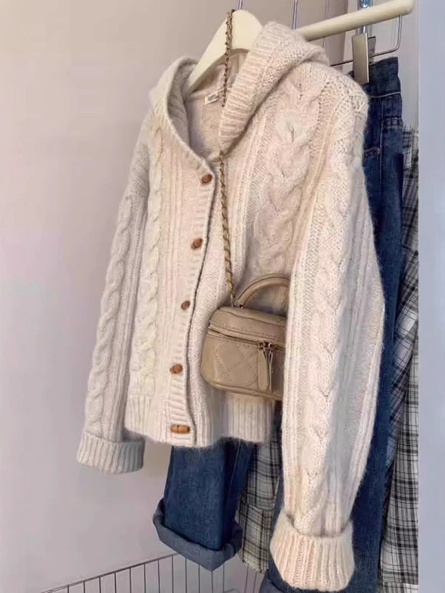 Women's hooded cardigan with cable knit, wooden button placket, and boxy silhouette Mune Fashion