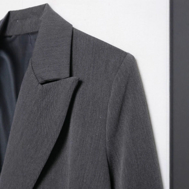 Women's oversized structured double-breasted blazer with wide lapels and patch pockets Mune Fashion