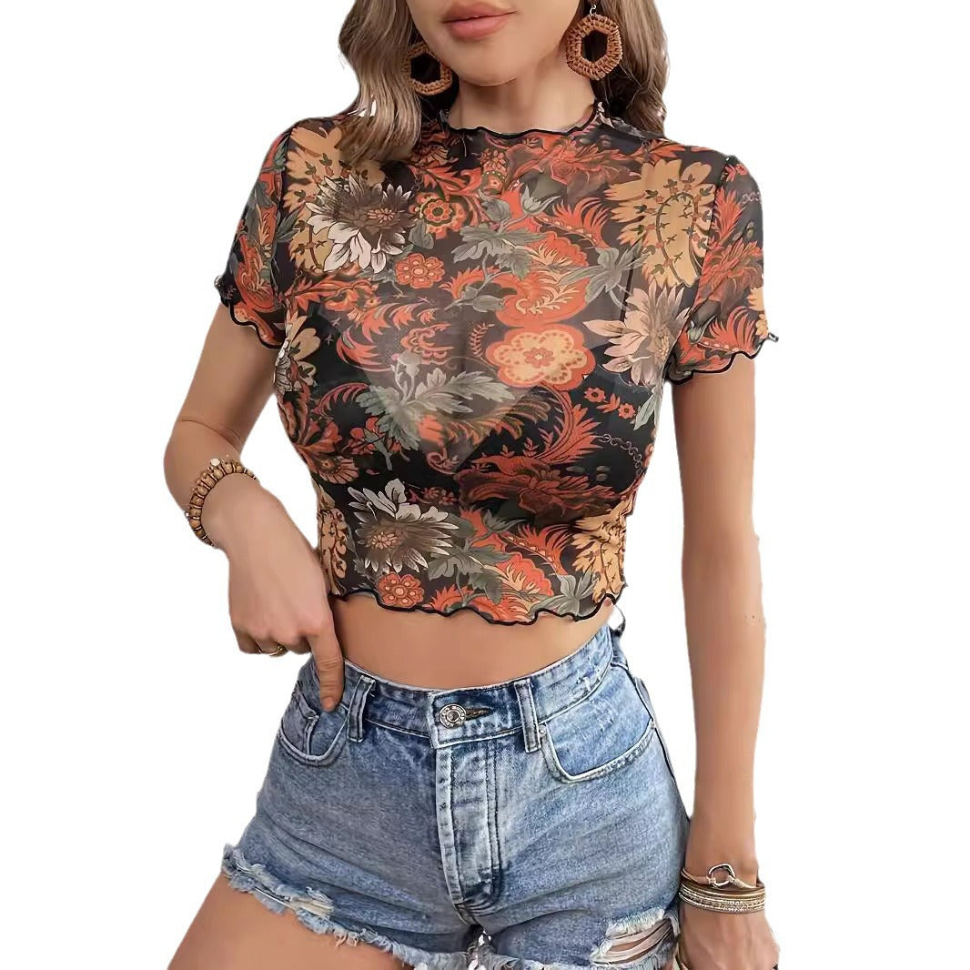 Women's cropped mesh top with semi-transparent floral pattern, stand-up collar, and wavy hem Mune Fashion