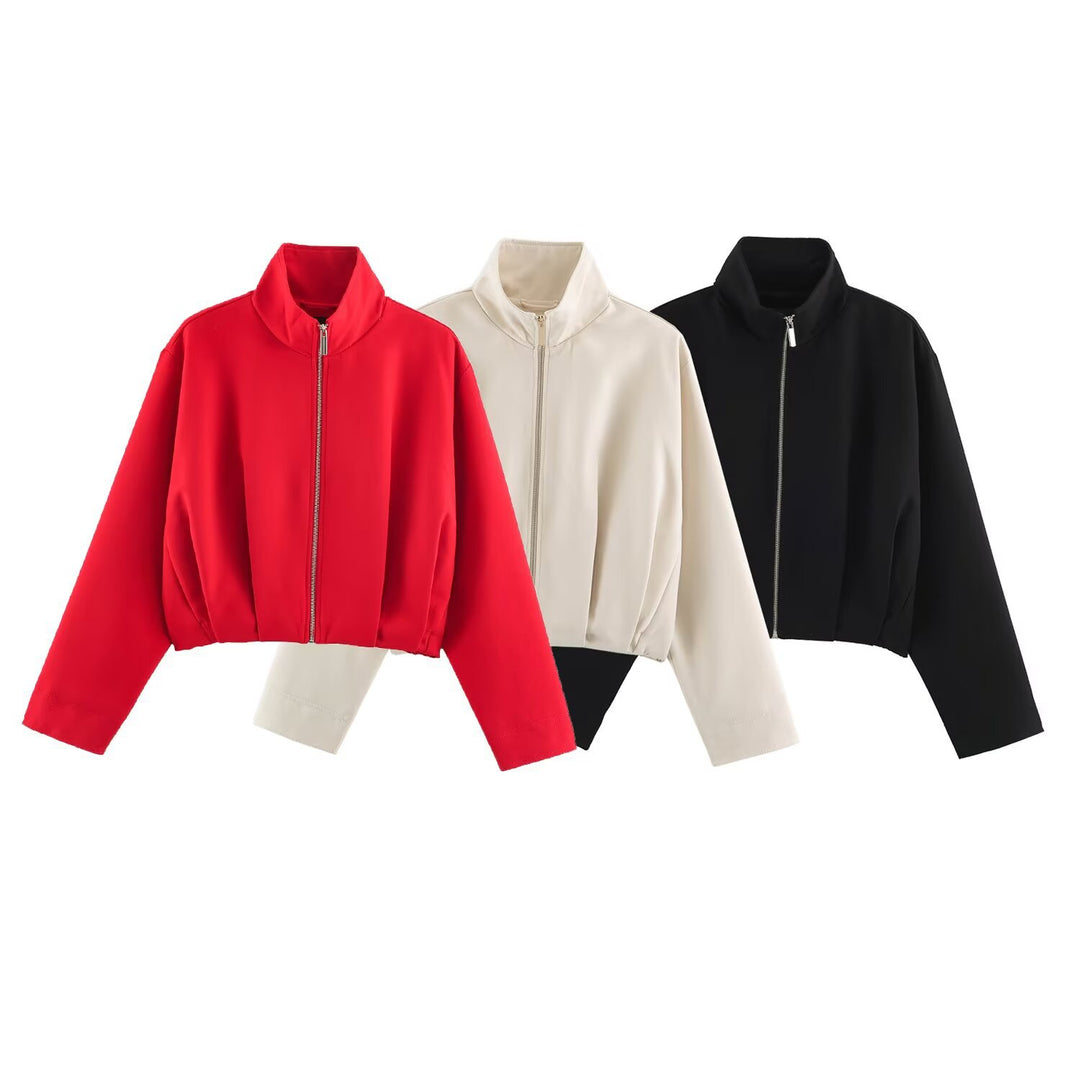 Ladies short jacket in boxy cut with high stand-up collar and elastic hem