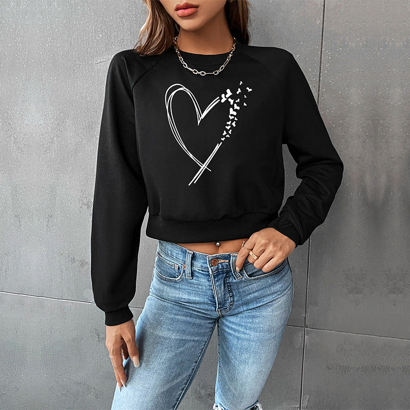 Women's cropped sweatshirt with heart print, round neckline and ribbed cuffs Mune Fashion