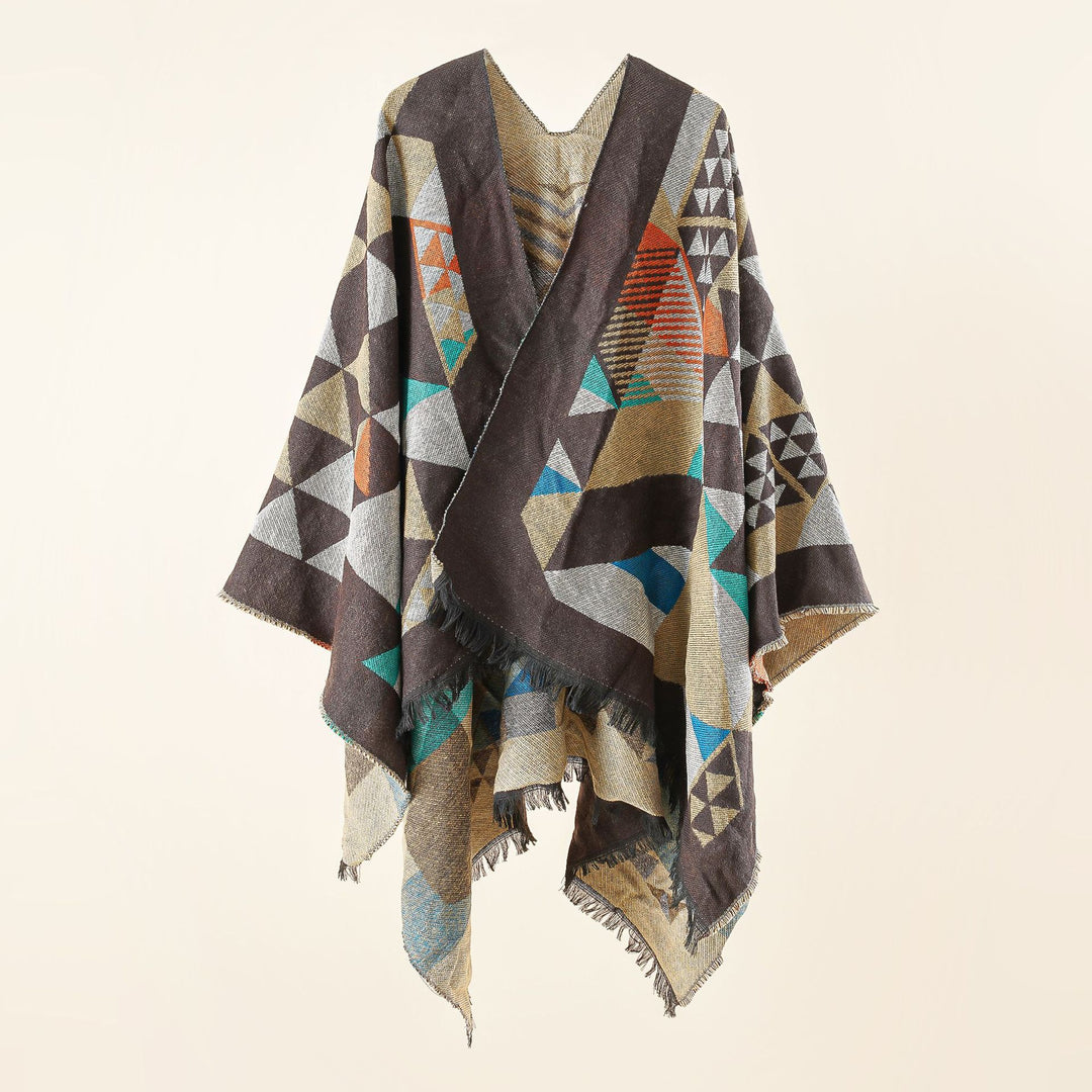 Women's oversized ruana in jacquard wrap style with triangular pattern and fringe hem Mune Fashion