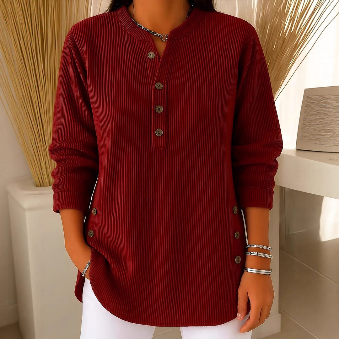 Women's plisse tunic blouse with stand-up collar, button placket and side decorative buttons Mune Fashion