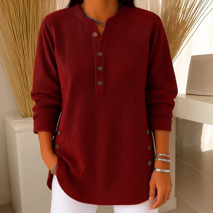 Women's plisse tunic blouse with stand-up collar, button placket and side decorative buttons Mune Fashion