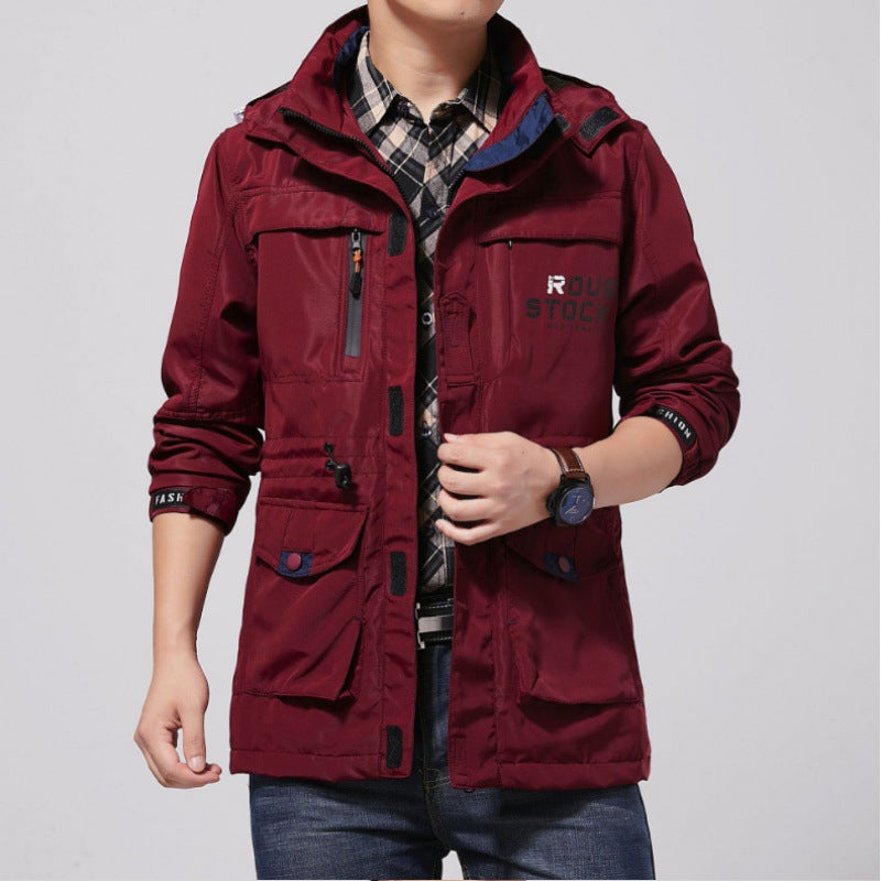 Men's lightweight windproof field jacket with breathable mesh inner lining, numerous zipper and flap pockets, as well as adjustable sleeve cuffs.