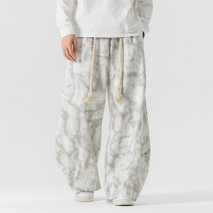Unisex wide batik harem pants with decorative drawstring and deep crotch Mune Fashion