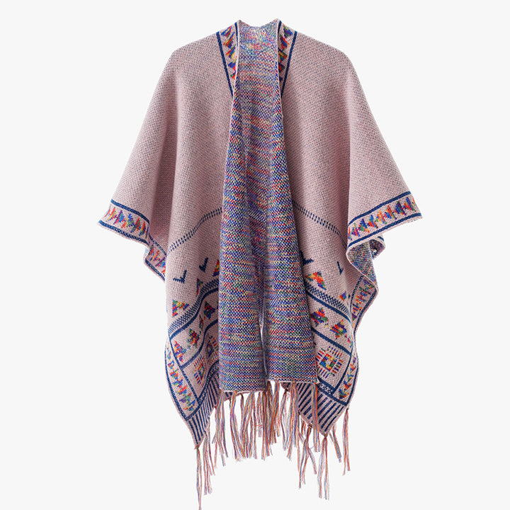 Women's chunky knit poncho with woven ethnic trim and fringes Mune Fashion