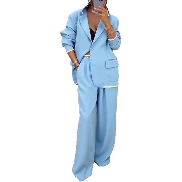 Women Oversize Tailoring Set with contrast piping, single-button blazer and high-cut wide-leg pants Mune Fashion