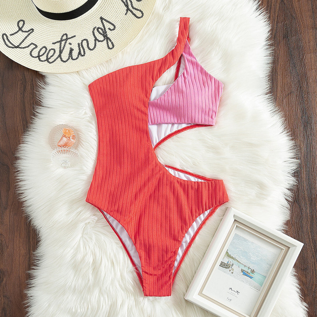 Women's one-piece swimsuit with asymmetrical cut and trendy cut-outs