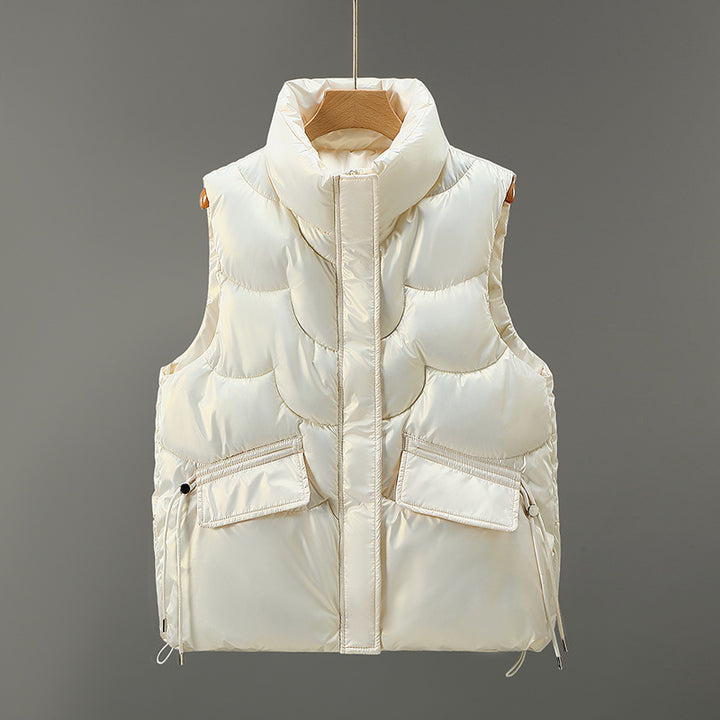 Women's quilted gilet with high stand-up collar, padded, two flap pockets and adjustable hem Mune Fashion