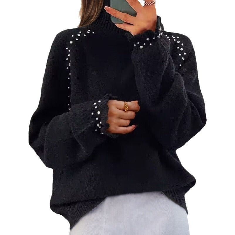 Ladies oversized knit sweater with stand-up collar and pearl details Mune Fashion