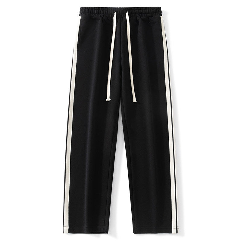 Men's loose-fitting joggers with elastic waistband, drawstring, and contrasting side stripes Mune Fashion