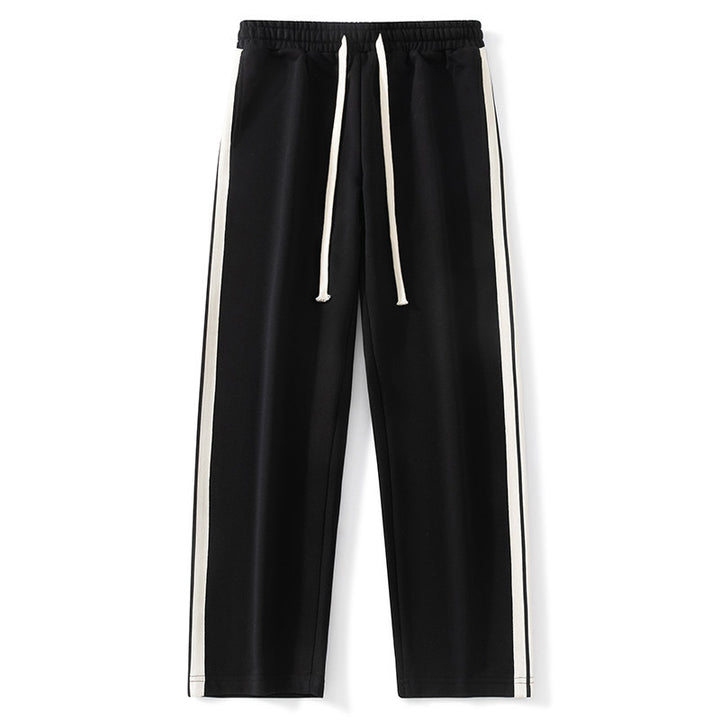 Men's loose-fitting joggers with elastic waistband, drawstring, and contrasting side stripes Mune Fashion