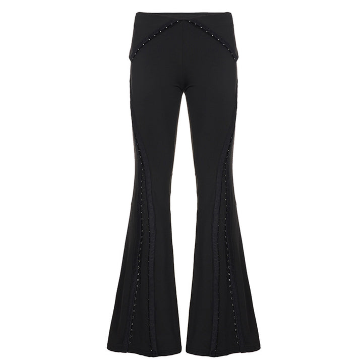 Women’s flared trousers with V waistband, side insert panels and decorative rivets Mune Fashion