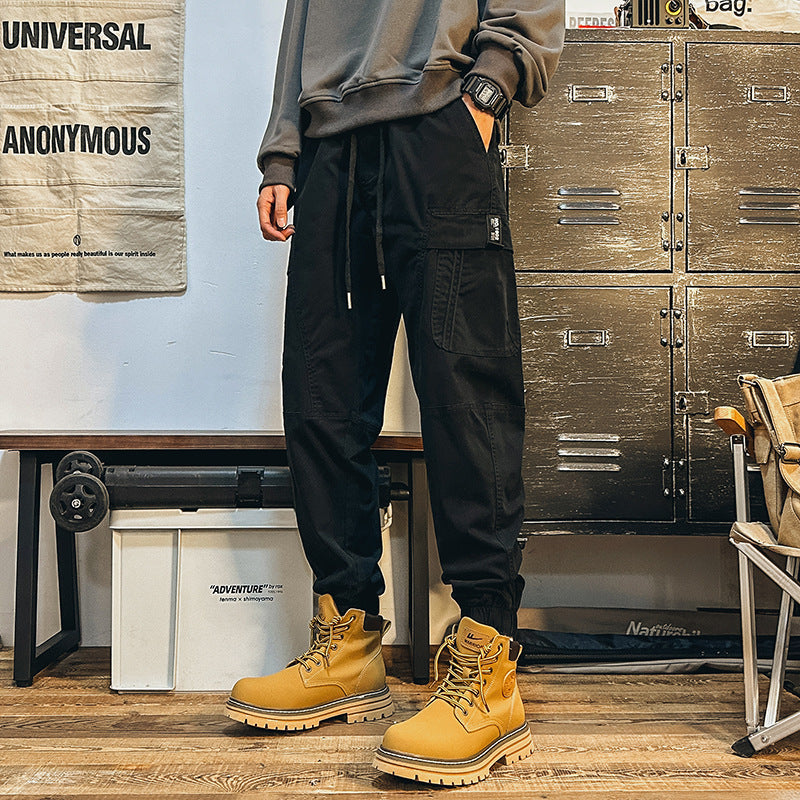 Men's cargo jogger pants with large flap pockets, elastic waistband, and ribbed cuffs Mune Fashion