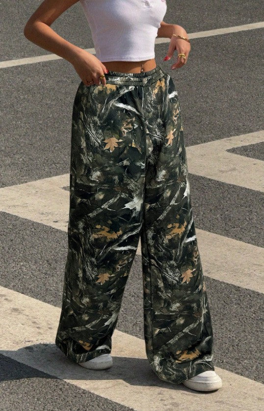 Women's wide Palazzo pants with floral all-over print and elastic waistband Mune Fashion