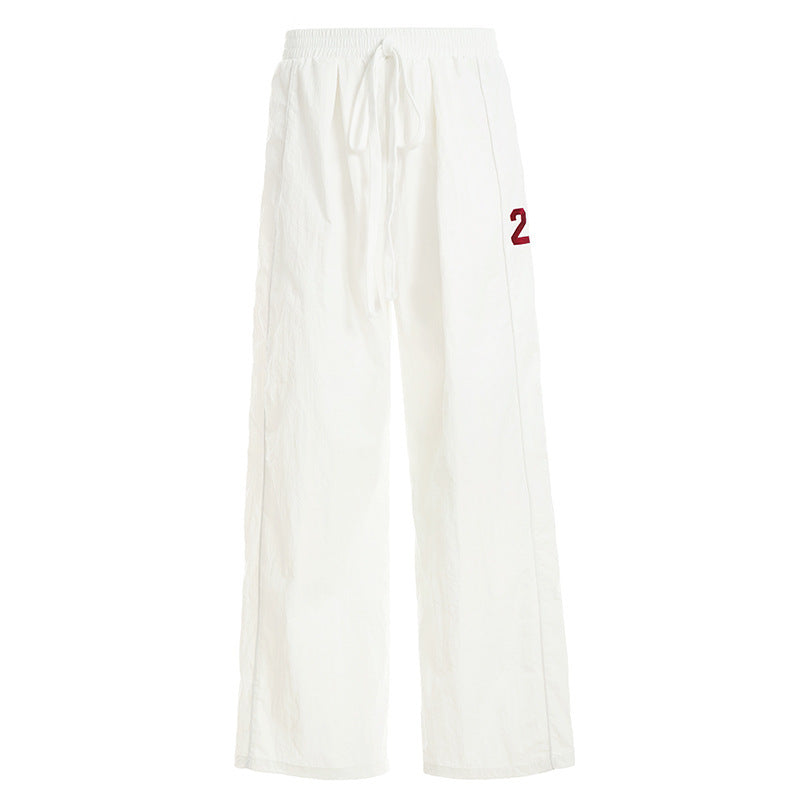 Ladies wide linen trousers with high elastic waistband, drawstring and casual palazzo cut Mune Fashion
