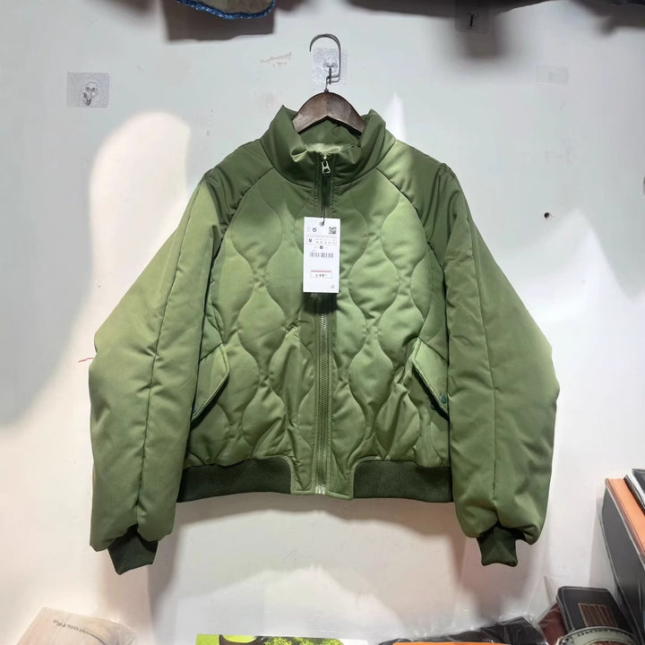 Women's quilted bomber jacket with high stand-up collar, lightweight thermal padding, and ribbed cuffs Mune Fashion