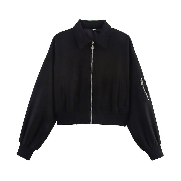 Women's cropped bomber jacket in velour look with shirt collar, sleeve pocket, and fitted ribbed waistband.