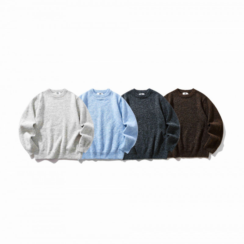 Unisex Oversize fine knit sweater with round neckline, ribbed cuffs, and mottled wool blend Mune Fashion