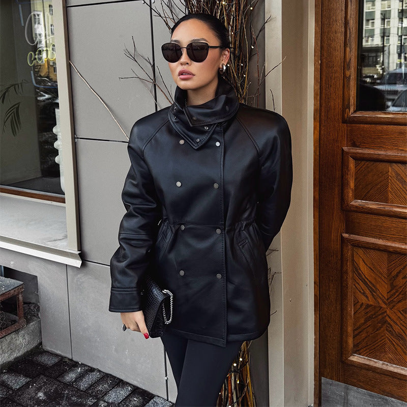 Women's rain jacket made of leather look with high stand-up collar, waist drawstring and snap button front Mune Fashion