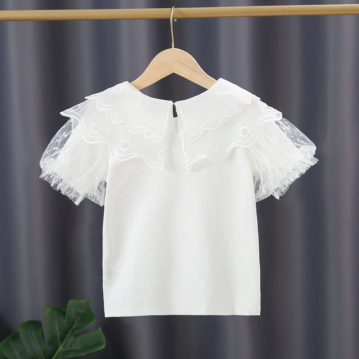 Girls blouse with transparent tulle sleeves and floral design Mune Fashion