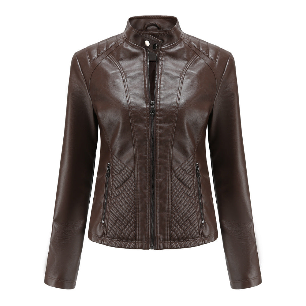 Women's fitted faux leather jacket in biker style with standing collar and quilted side panels Mune Fashion