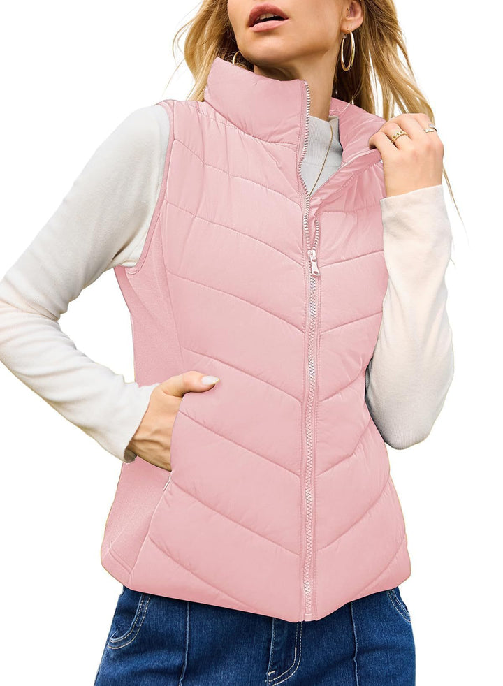 Women's quilted thermo vest with high stand-up collar and elastic side inserts Mune Fashion
