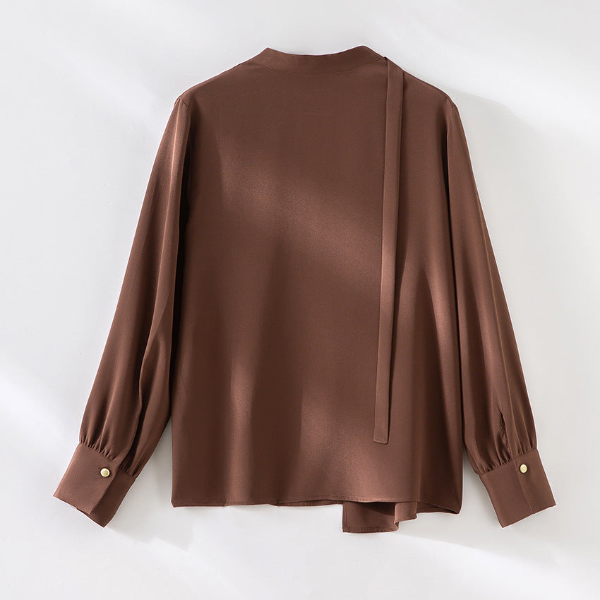 Women's elegant oversized blouse with asymmetrical V-neck and cuffed sleeves Mune Fashion