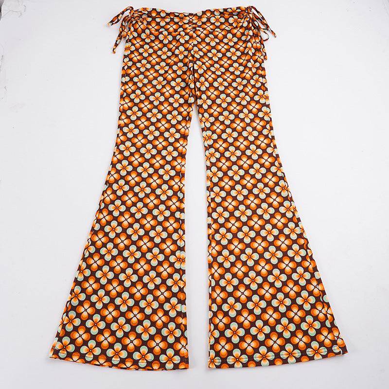 Women's flared high-waisted trousers with side drawstrings and retro floral print Mune Fashion