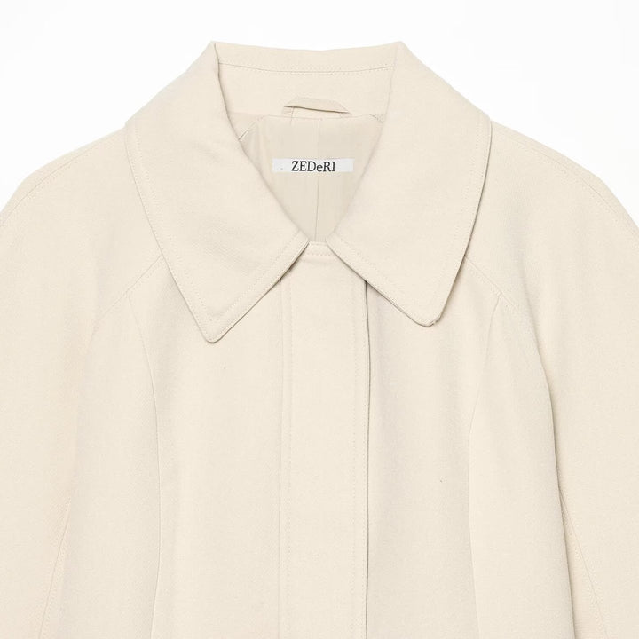 Women's cropped jacket in minimalist trench style with wide shirt collar and tie belt Mune Fashion