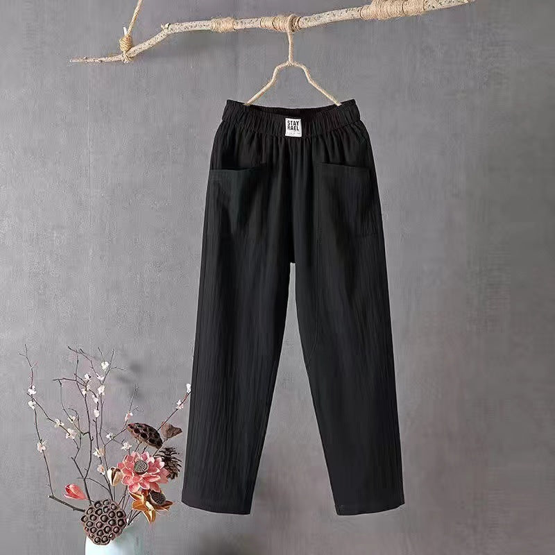 Ladies casual linen blend trousers with elastic waistband, straight leg, and large patch pockets Mune Fashion