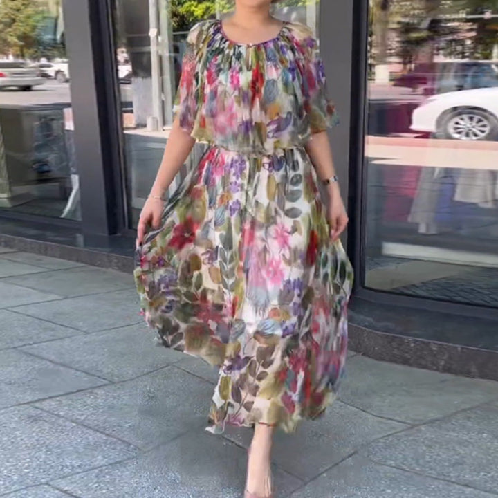 Women’s airy chiffon maxi dress with floral print, gathered round neckline and elastic waistband Mune Fashion