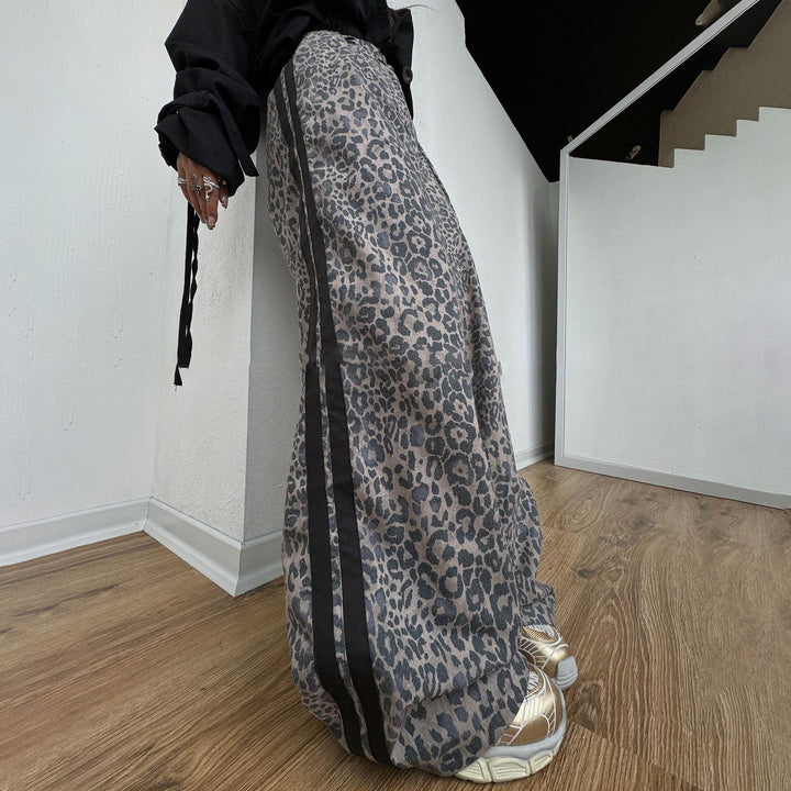 Ladies wide leopard track pants with elastic waistband and side contrast stripes Mune Fashion