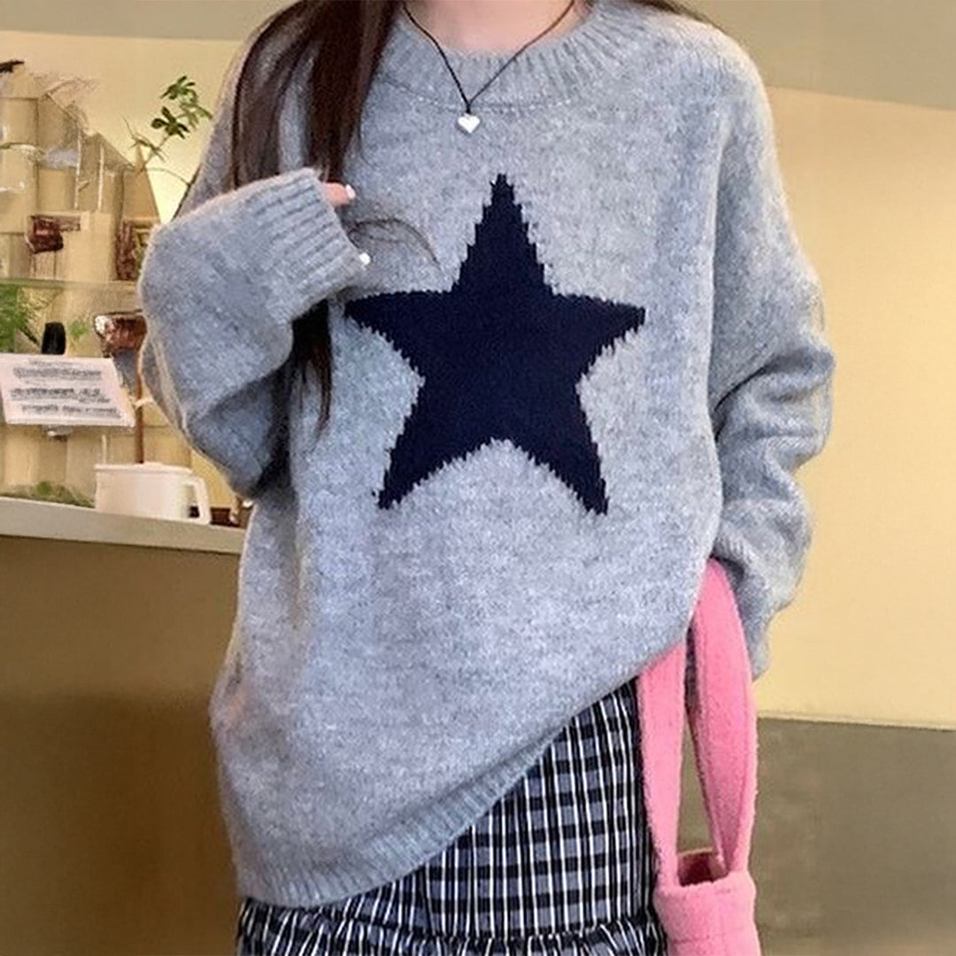 Women's oversized knit sweater with striking star motif, round neckline and ribbed cuffs Mune Fashion
