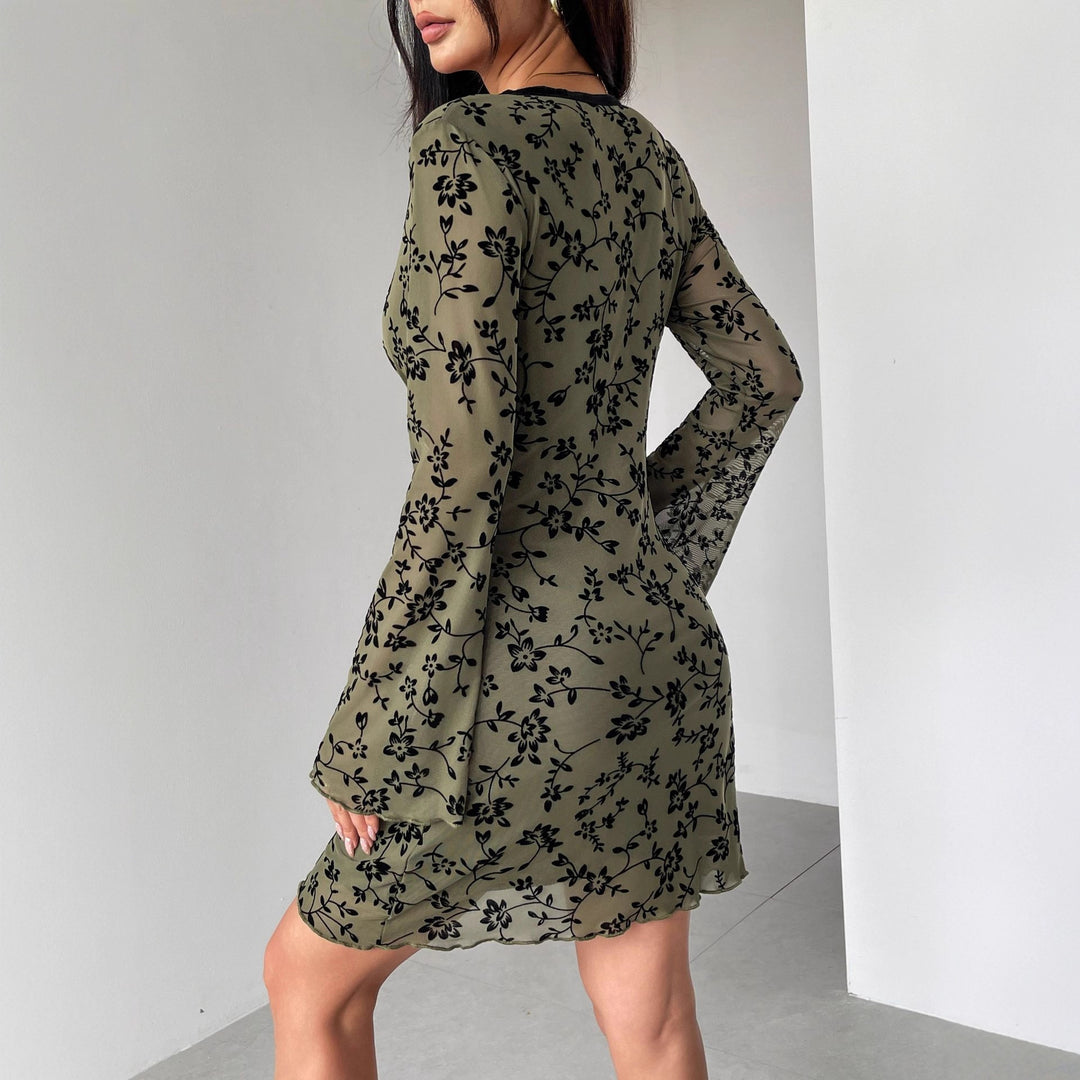 Women's fitted mesh mini dress with velvet flock floral pattern, deep V-neckline and bow appliqué Mune Fashion
