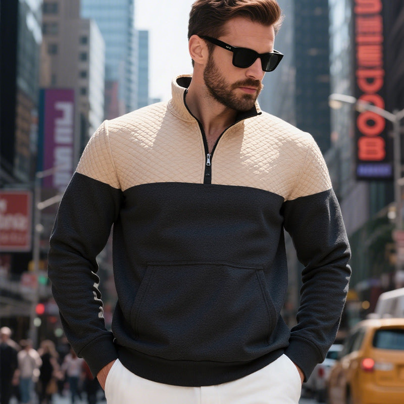 Men's color block half zip sweatshirt with quilted chest area, kangaroo pocket, and elastic cuffs Mune Fashion