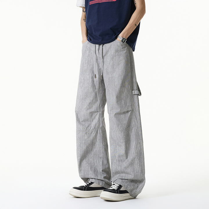 Damen Weite Leinenoptik Cargo-Bundhose mit Tunnelzug, Knieabnähern und asymmetrischer Seitentasche Mune Fashion