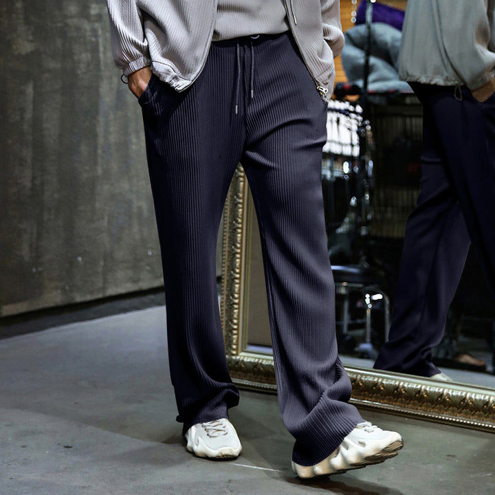 Men's loosely cut pleated trousers with drawstring and wide leg Mune Fashion